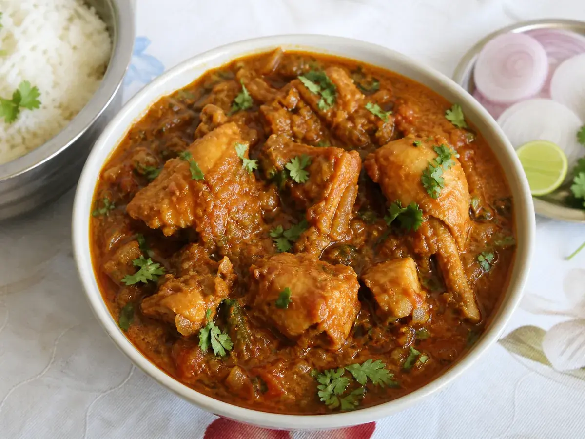 Home-cooked chicken curry with rice, a fresh non-vegetarian home food delivery meal